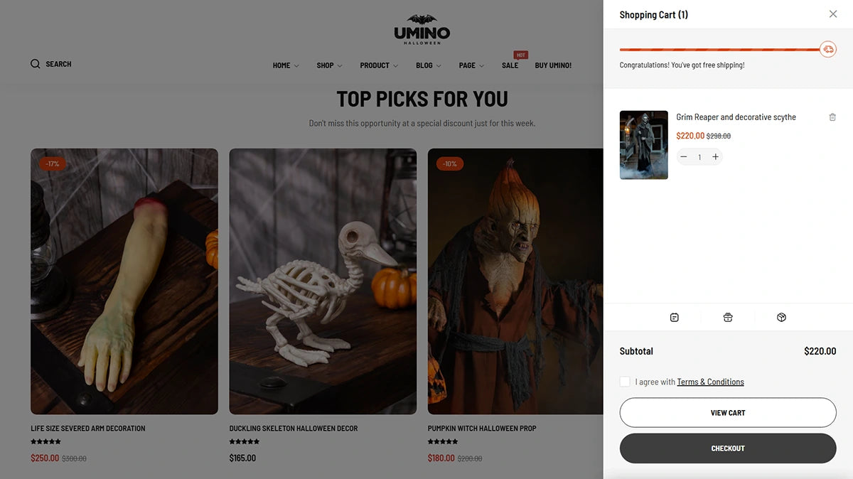 E-commerce website page with Halloween decorations and shopping cart on the right.